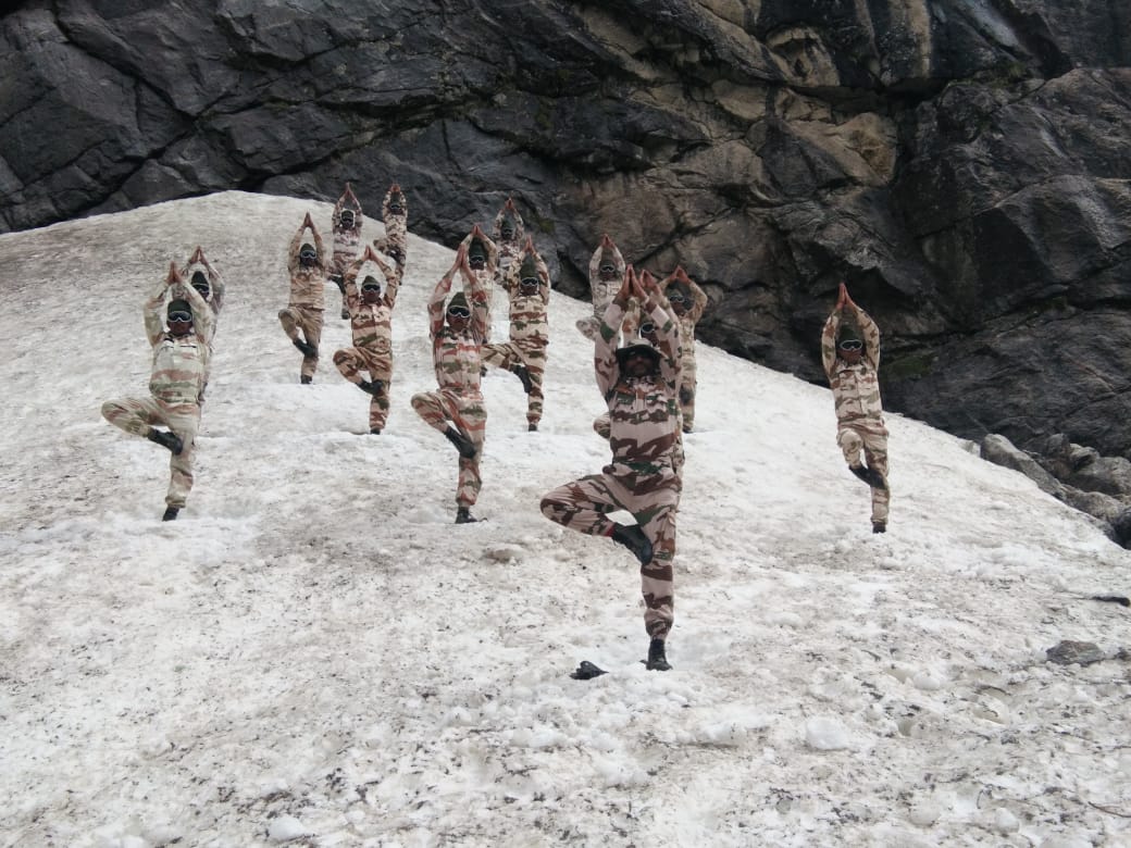 Himveers practicing yoga from 12 to 19,000 feet in the Himalayas 